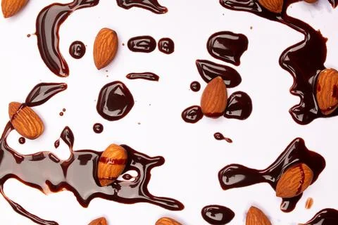 Top view composition or background with delicious chocolates and nuts Stock Photos