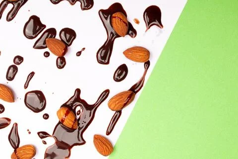 Top view composition or background with delicious chocolates and nuts Stock Photos