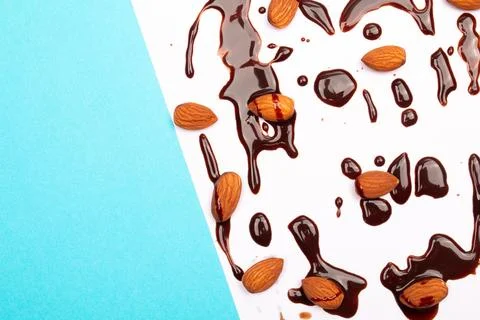 Top view composition or background with delicious chocolates and nuts Stock Photos