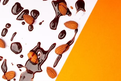 Top view composition or background with delicious chocolates and nuts Stock Photos