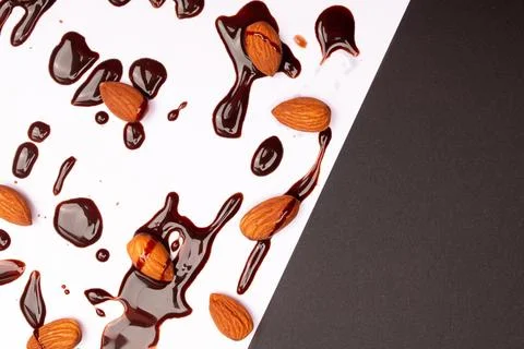 Top view composition or background with delicious chocolates and nuts Stock Photos