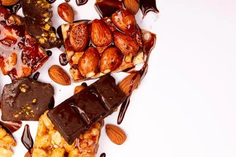 Top view composition or background with delicious chocolates and nuts Stock Photos