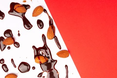 Top view composition or background with delicious chocolates and nuts Stock Photos