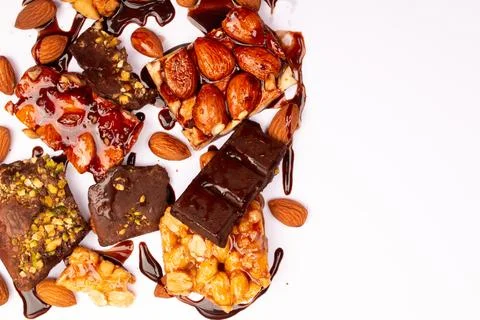 Top view composition or background with delicious chocolates and nuts Stock Photos