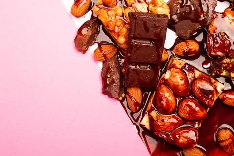 Top view composition or background with delicious chocolates and nuts Stock Photos