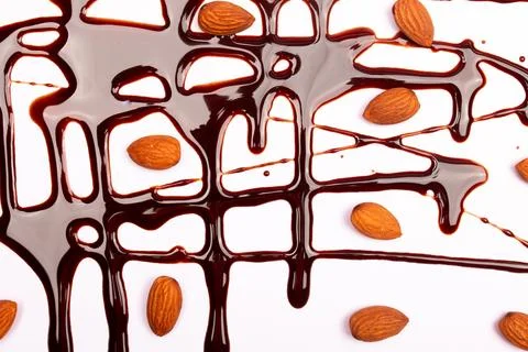 Top view composition or background with delicious chocolates and nuts Stock Photos