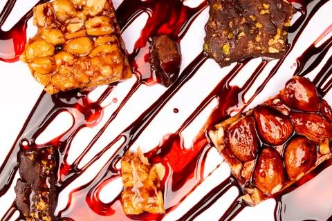 Top view composition or background with delicious chocolates and nuts Stock Photos