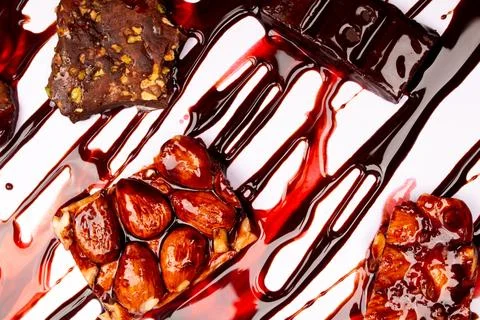 Top view composition or background with delicious chocolates and nuts Stock Photos