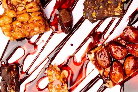 Top view composition or background with delicious chocolates and nuts Stock Photos