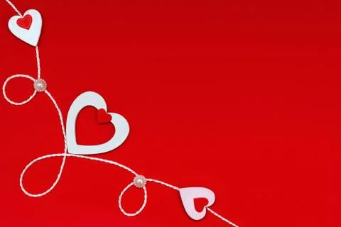 Top view of a composition for Valentine's Day on a red background with white  Stock Photos