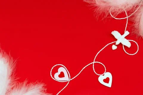  Top view of a composition for Valentine's Day on a red background with white Stock Photos