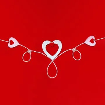 Top view of a composition for Valentine's Day on a red background with white  Stock Photos