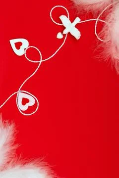  Top view of a composition for Valentine's Day on a red background with white Stock Photos