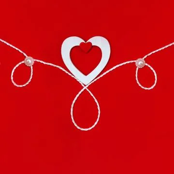 Top view of a composition for Valentine's Day on a red background with white  Stock Photos