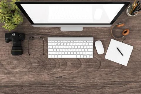 Top view of computer and camera dslr on table. Stock Photos