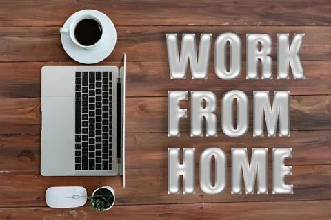 Top view of Computer laptop and coffee cup on wooden desk,Computer laptop and Stock Photos
