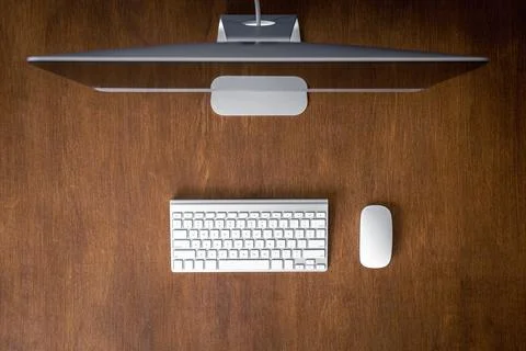 Top view, computer on a wooden table, work desk. Stock-Fotos