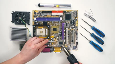 Top view of Comuter electronics repair with soldering Iron. Stock Footage 65923495