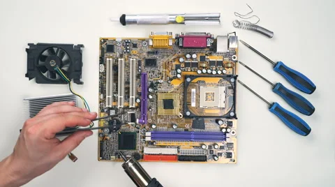 Top view of Comuter electronics repair with soldering Iron.  Stock Footage 65929288