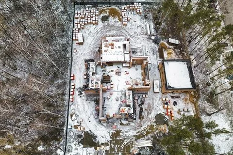 Top view of the construction site. Construction of a red brick house. Buildin Stock Photos