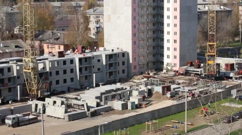 Top view of construction site with crane and new concrete panel building Stock Footage 62593090