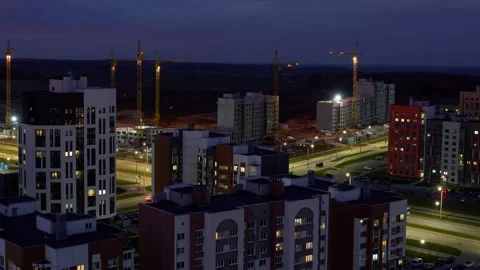 Top view of the construction site. Night timelapse of working cranes Stock Footage 321267458