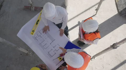 Top view of construction worker handshaking in a house construction site. Stock Footage 182422130