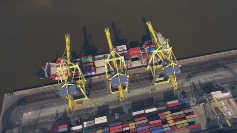 Top view of container ship unloading in port Stock Footage 75734398