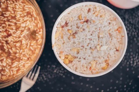 Top view of containers with different rice dishes of chinese food. Stock Photos