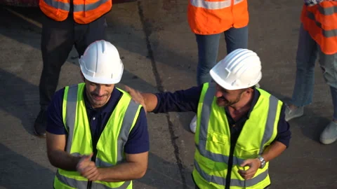 Top view of Containers worker standing  excited and raised hand up to success Stock Footage 157717011