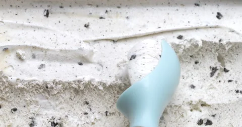 Top view of cookie cream flavored ice cream scoop. Stock Footage 235404742