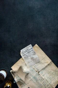 Top view of cookie cutter on old recipe and groceries list. Stock Photos