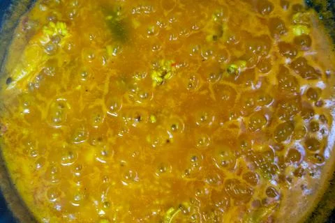Top view of the cooking process of rice for a typical Spanish seafood paella, Stock Photos