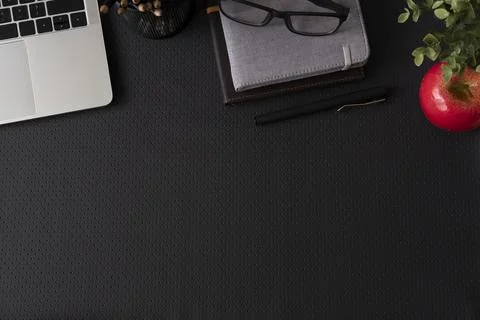 Top view with copy space of office leather desk table with computer supplies. 写真素材