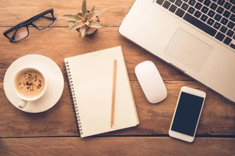 Top view with copy space, working desk with laptop,cellphone,notebook pencil Stock Photos