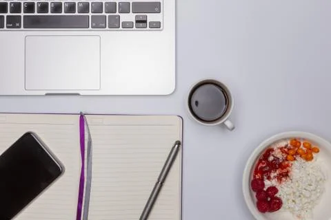 Top view, copyspace, white table, computer, coffee, curd and jam Stock Photos