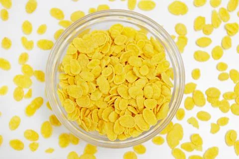 Top view of corn flakes served in glass bowl Stock Photos