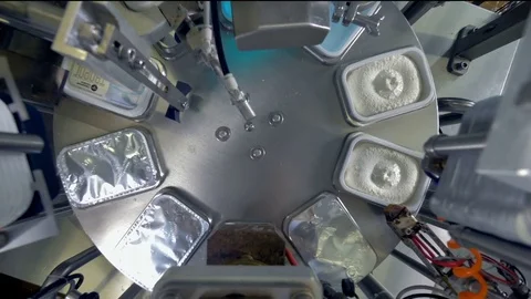 A top view on cottage cheese full cycle packaging. Stock Footage