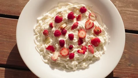 Top View Cottage Cheese With Sour Cream, Fresh Strawberries Stock Footage 327804972