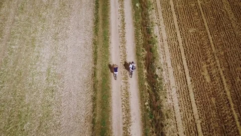 Top view of a couple on bicycle 스톡 동영상 78378767