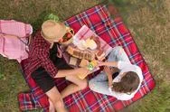 Top View Of Couple Enjoying Picnic Time Stock Photos