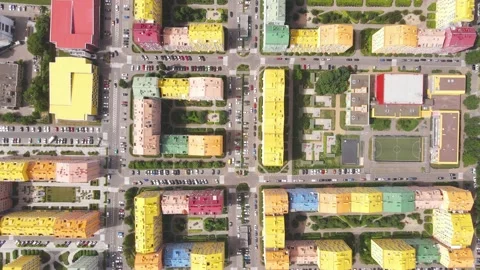 Top view of the courtyards and roads of a residential area with colorful houses Stock Footage 156444404