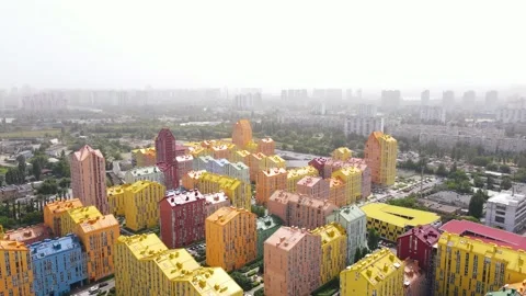 Top view of the courtyards and roads of a residential area with colourful houses Stock Footage 164595118