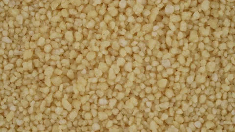 Top view of couscous groat rotating. Closeup. Macro. Stock-Footage 170650477