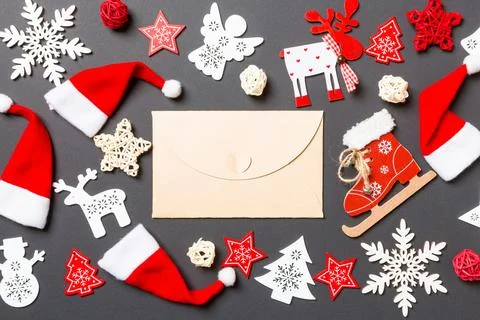 Top view of craft envelope. New Year decorations on black background. Merry.. Stock Photos