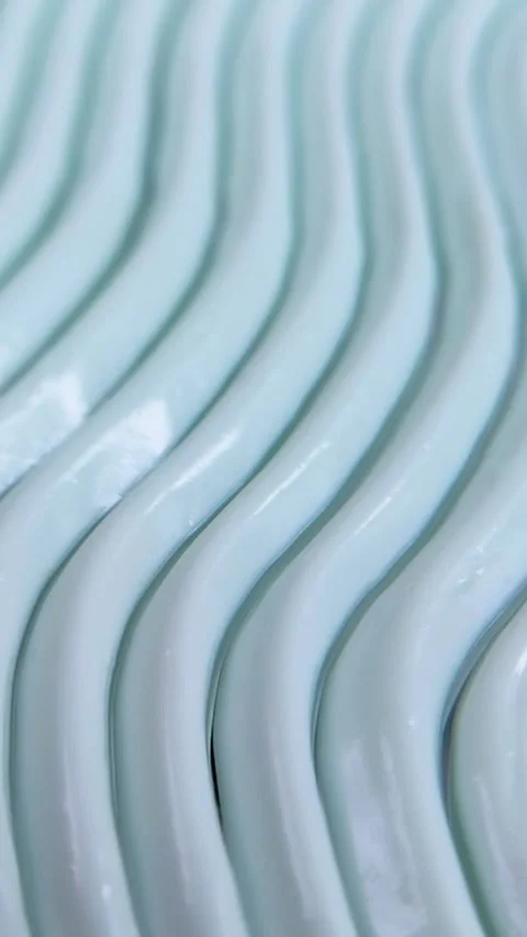 Top view of cream with wavy pattern moving slowly forming abstract waves. S.. Stock Footage 339899179