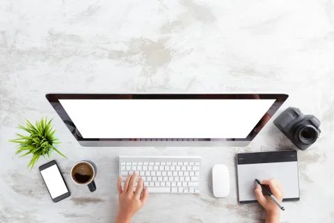 Top view of creative photographer using graphic tablet on work table Stock Photos