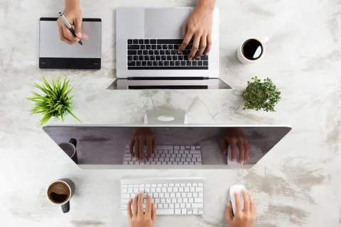 Top view of creative working desk Stock Photos