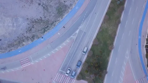 Top view of a crowdy road chase drone shot Stock Footage 103116214