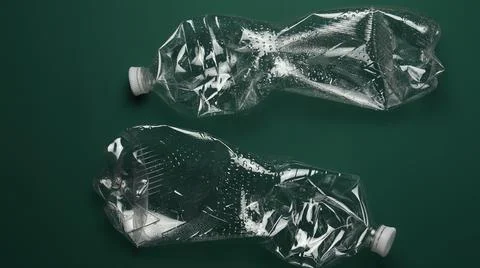 Top view of crushed empty PET plastic bottles prepared for recycling Stock Photos